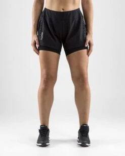 Craft Essential 2-in-1 Hardloop Short Zwart Dames -Craft 1906029 999000 essential 2 in 1 shorts c1